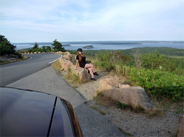 Karen Duquette waits for Lee to set up the self-timer on the camera
