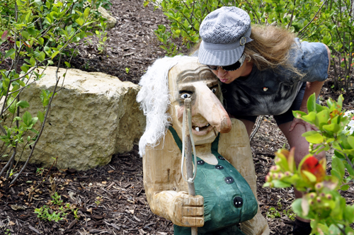 Karen Duquette kisses a troll