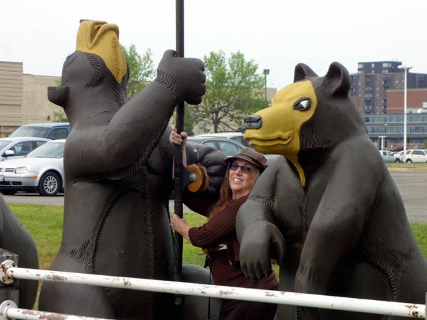 Karen Duquette helps the bears reel in the fish