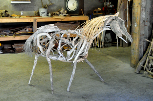 a horse in the wood shed