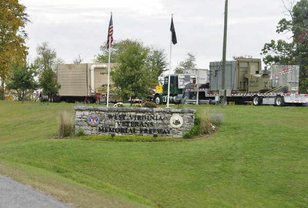 West Virginia Verterans Memorial Freeway sign and flags