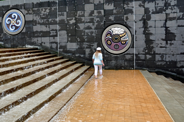Karen enjoys walking in the water?at Ross Landing.