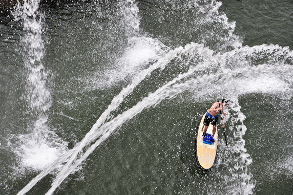 A person on a stand-up board