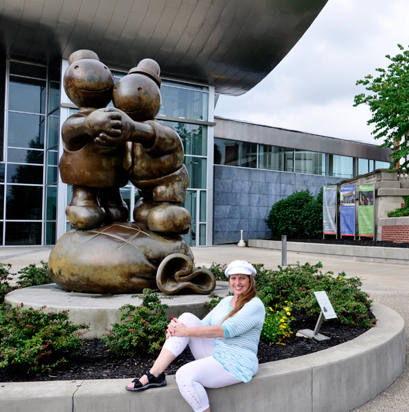 Karen Duquette and a piece of art