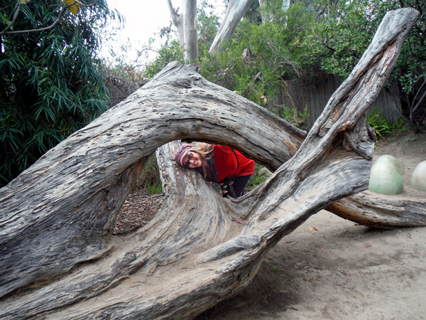 Karen Duquette plays in the tree