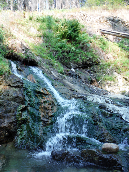 water cascading down the cliff side