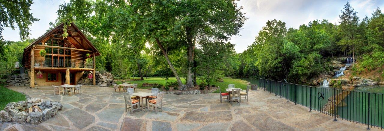 panoramoa of the chapel patio and waterfall