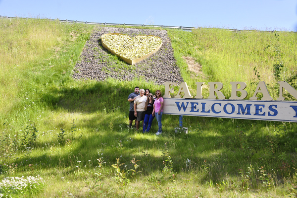 everyone at the welcome sign