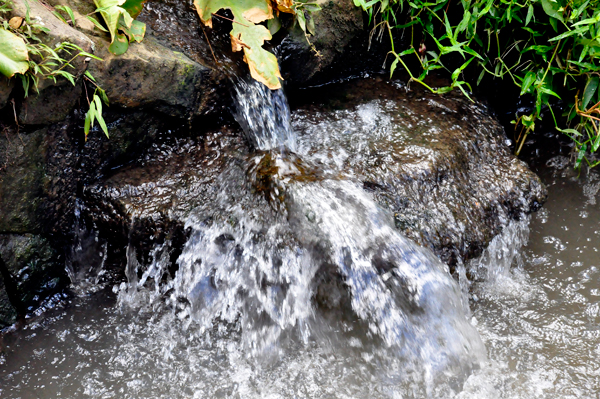 close-up of water flowing over the rocks