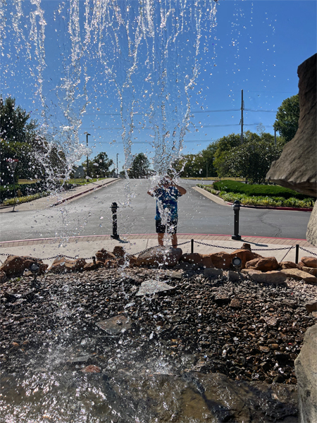 Lee Duquette in front of the waterfall