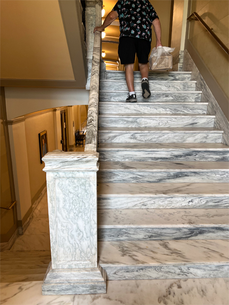 marble staircase and a headless Lee Duquette