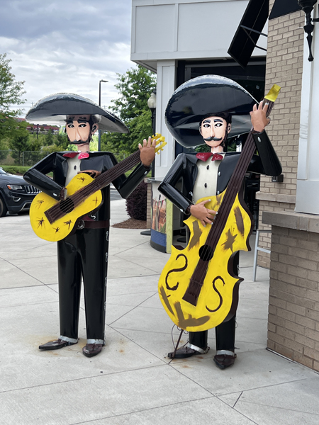 Mexican dudes at the doorway