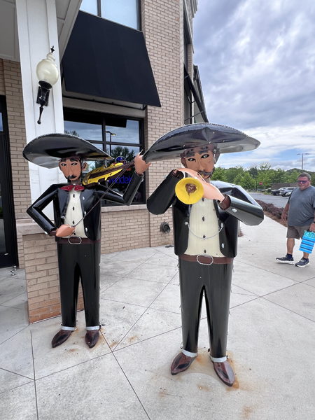 Mexican dudes at the doorway