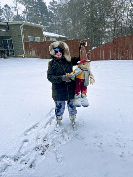 Karen Duquette and a scarecrow