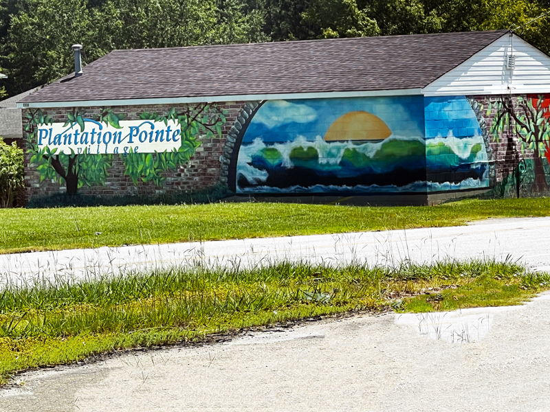 Plantation Point Village bulding and mural