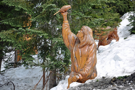 man and bird carving