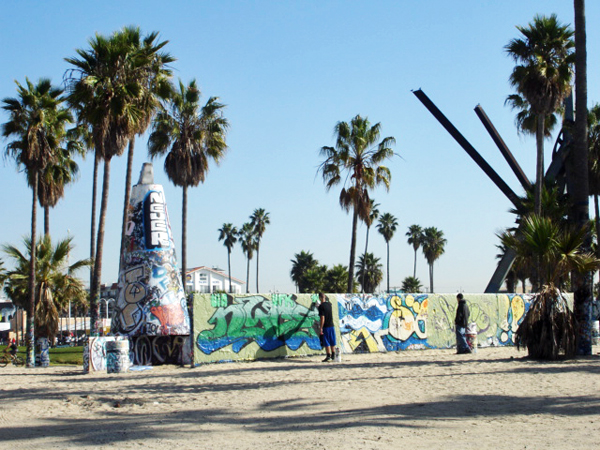 people painting the wall in Hollywood Beach, California